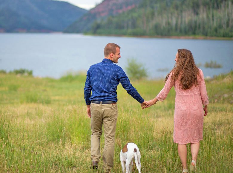 Couple walking on shore Couple walking on shore